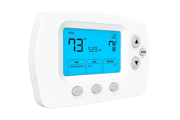 A digital thermostat displays an inside temperature of 79°F, a cooling set point of 71°F, and the time 5:23 PM, with control buttons on the right and below the screen.
