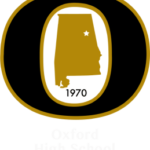 Oxford High School logo showing a gold outline of Alabama with a star, the year 1970, and "Oxford High School" written below.